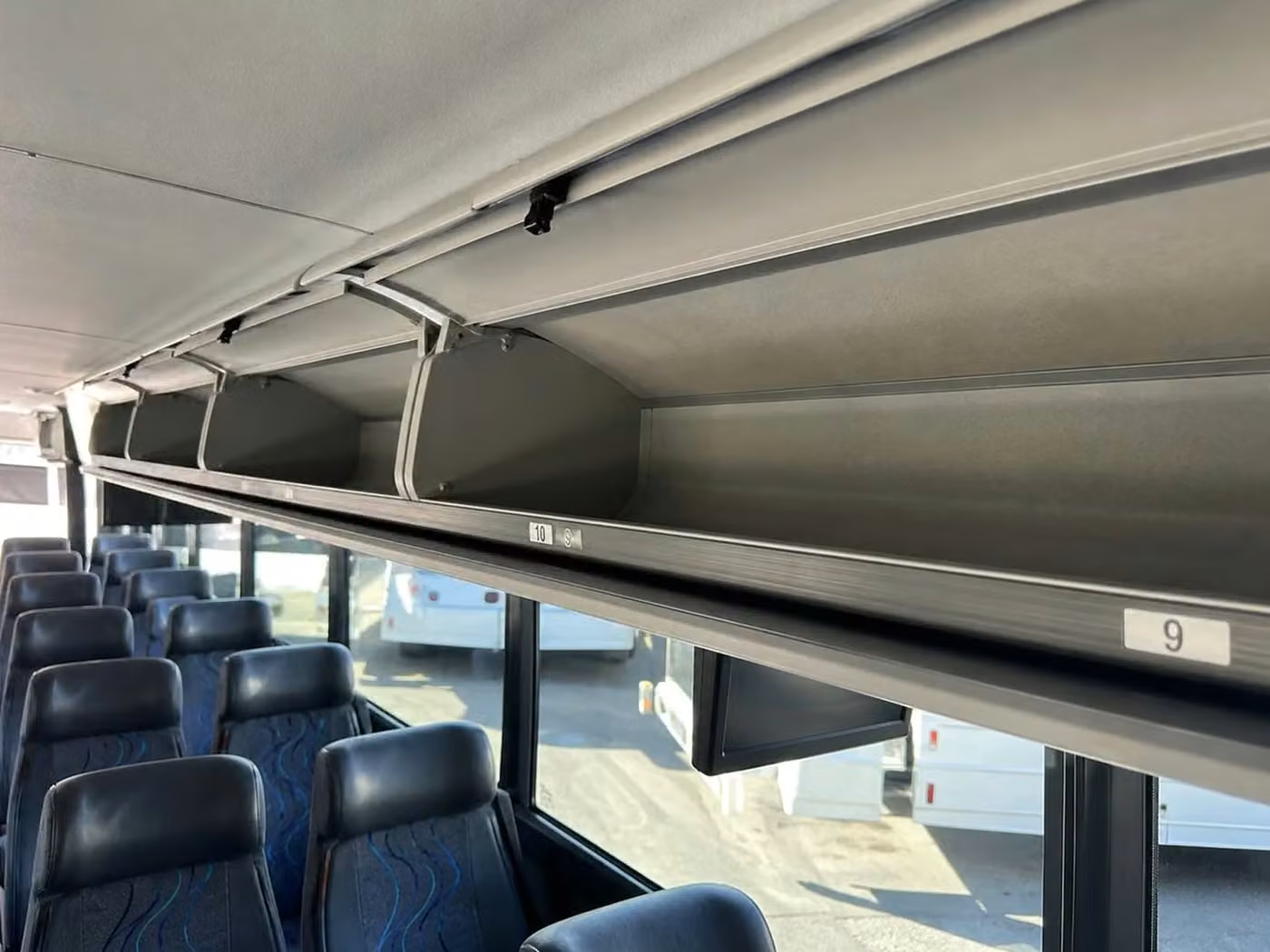 stanton 25 passenger minibus overhead storage