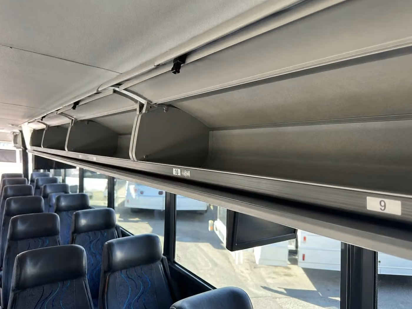 stanton 35 passenger minibus overhead storage