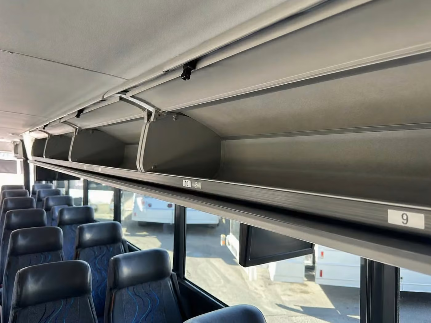 stanton charter bus overhead storage